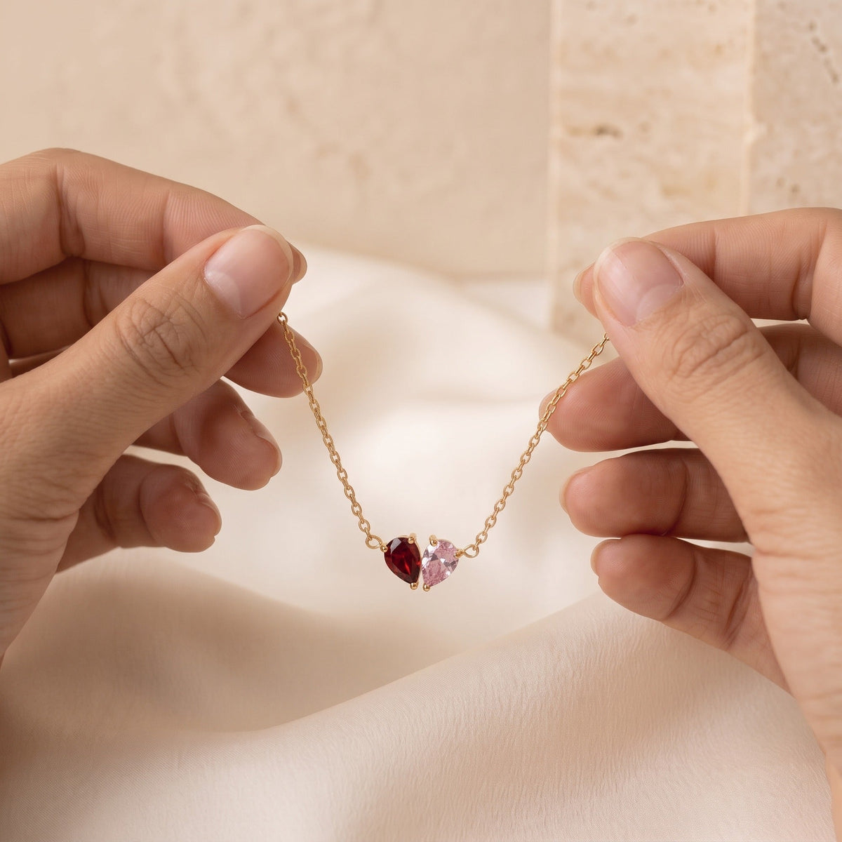 The Elora Bracelet held open between two hands