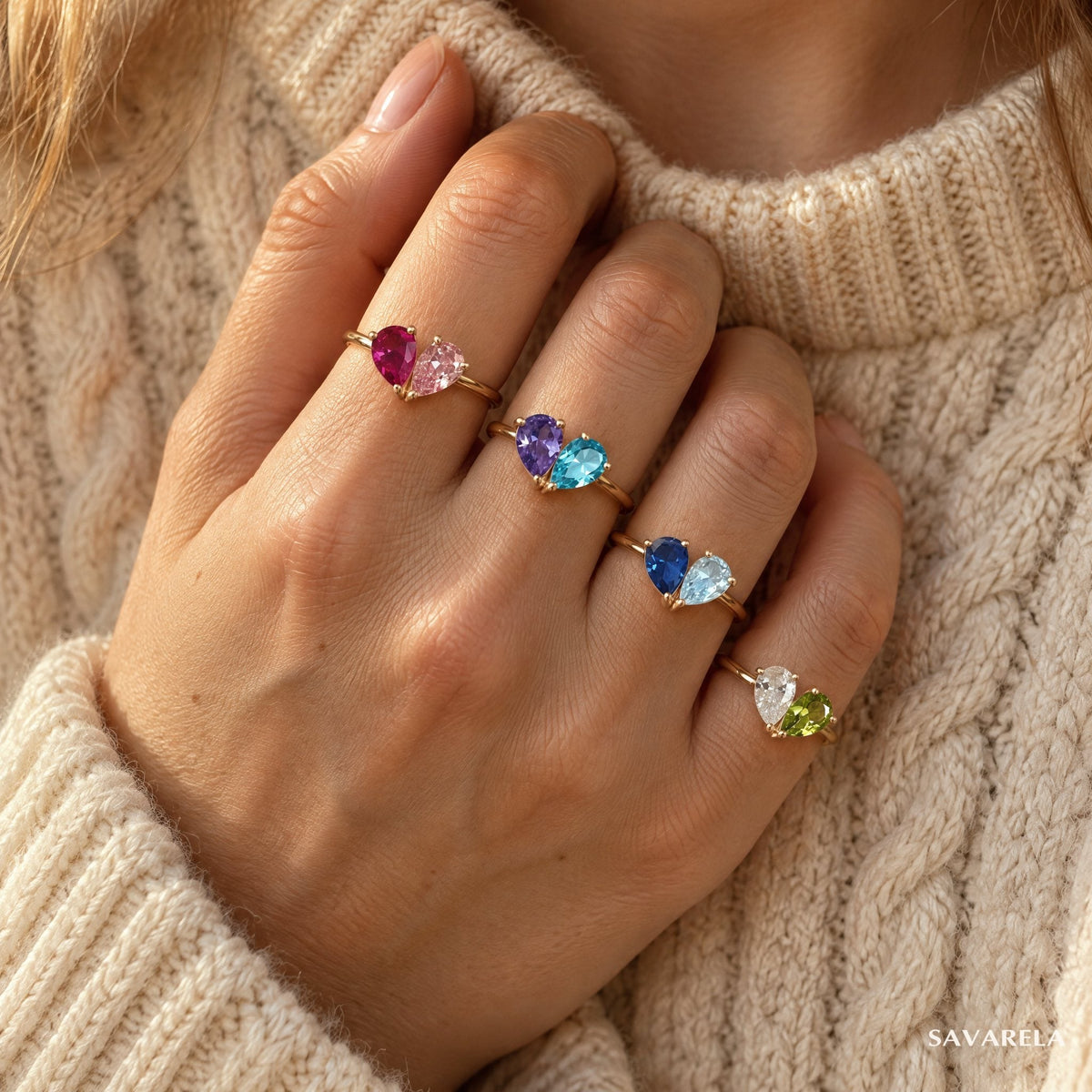 Four Elora rings worn together