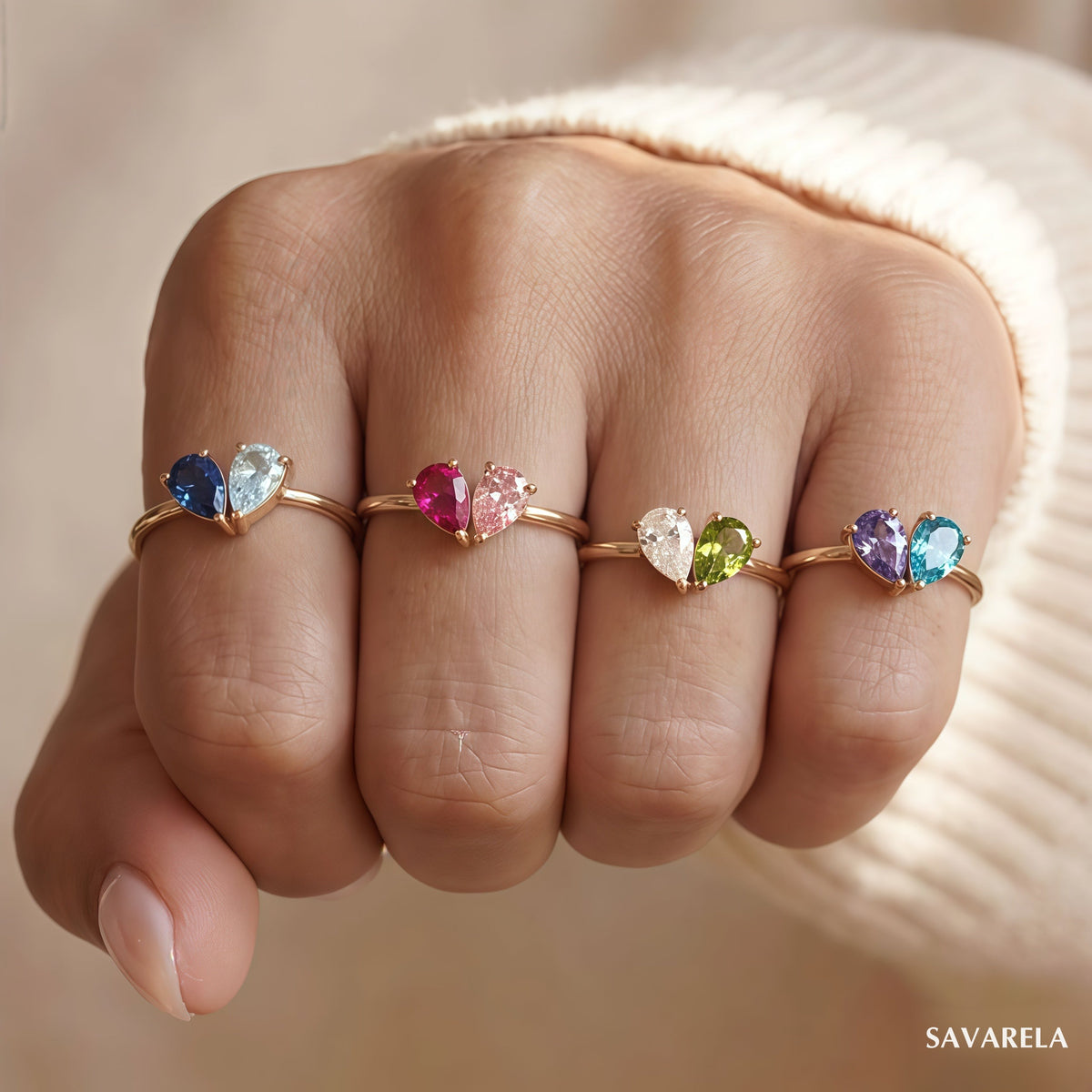 Four Elora rings worn together