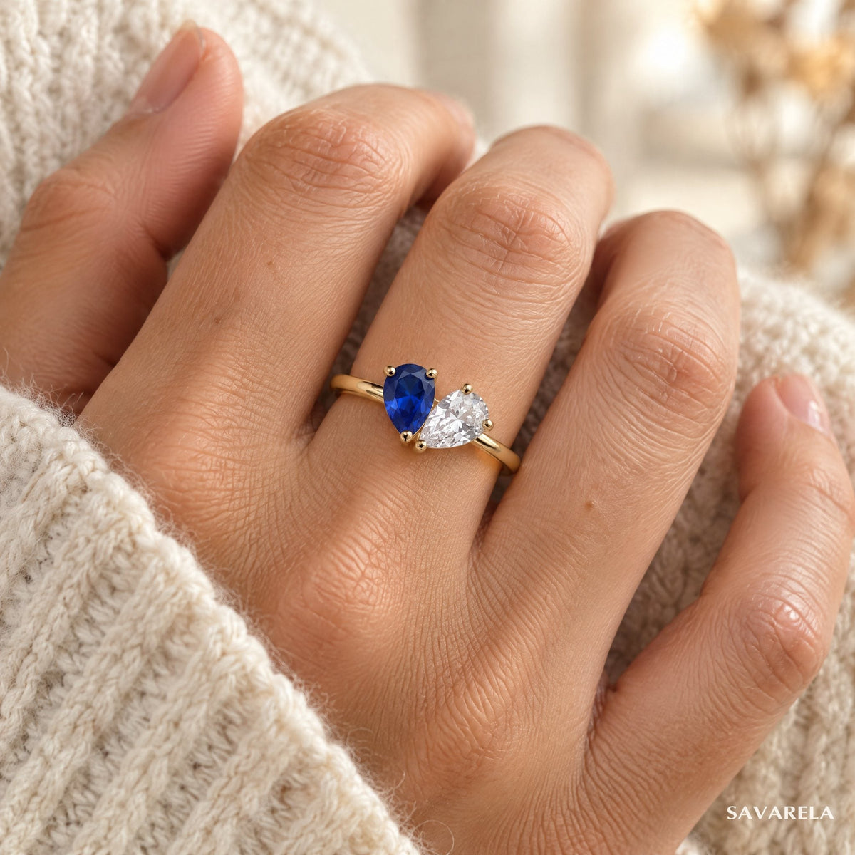 Elora ring worn on the hand