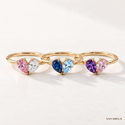 Three Elora rings with different birthstones