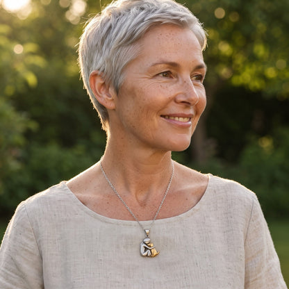 Woman wearing the Eternal Hug Necklace outdoors