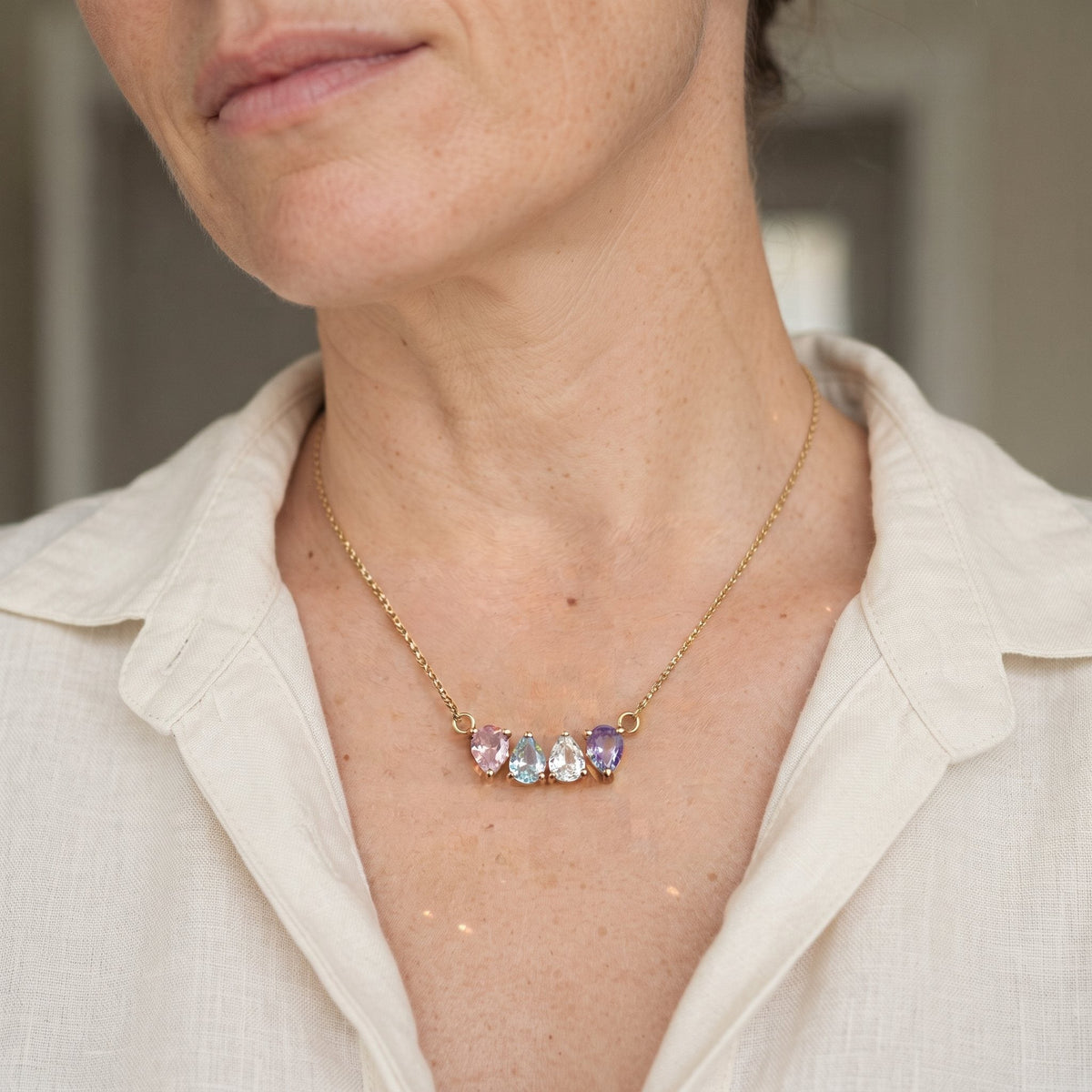 Kindred Necklace worn, five birthstones